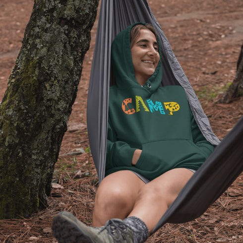 Introducing our vibrant and adventurous camping hoodie! Featuring bold and colorful "Camp" letters adorned with charming camping icons cut out, this shirt is perfect for outdoor enthusiasts and nature lovers alike.